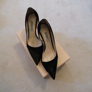 Black suede Prada heels with glossy point detail